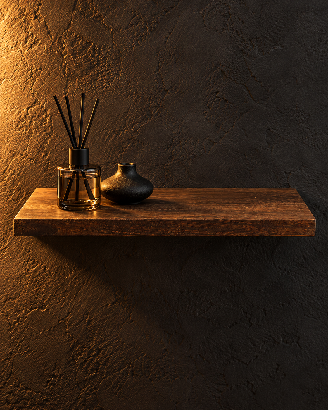 Brown wooden floating shelf styled against a charcoal wall