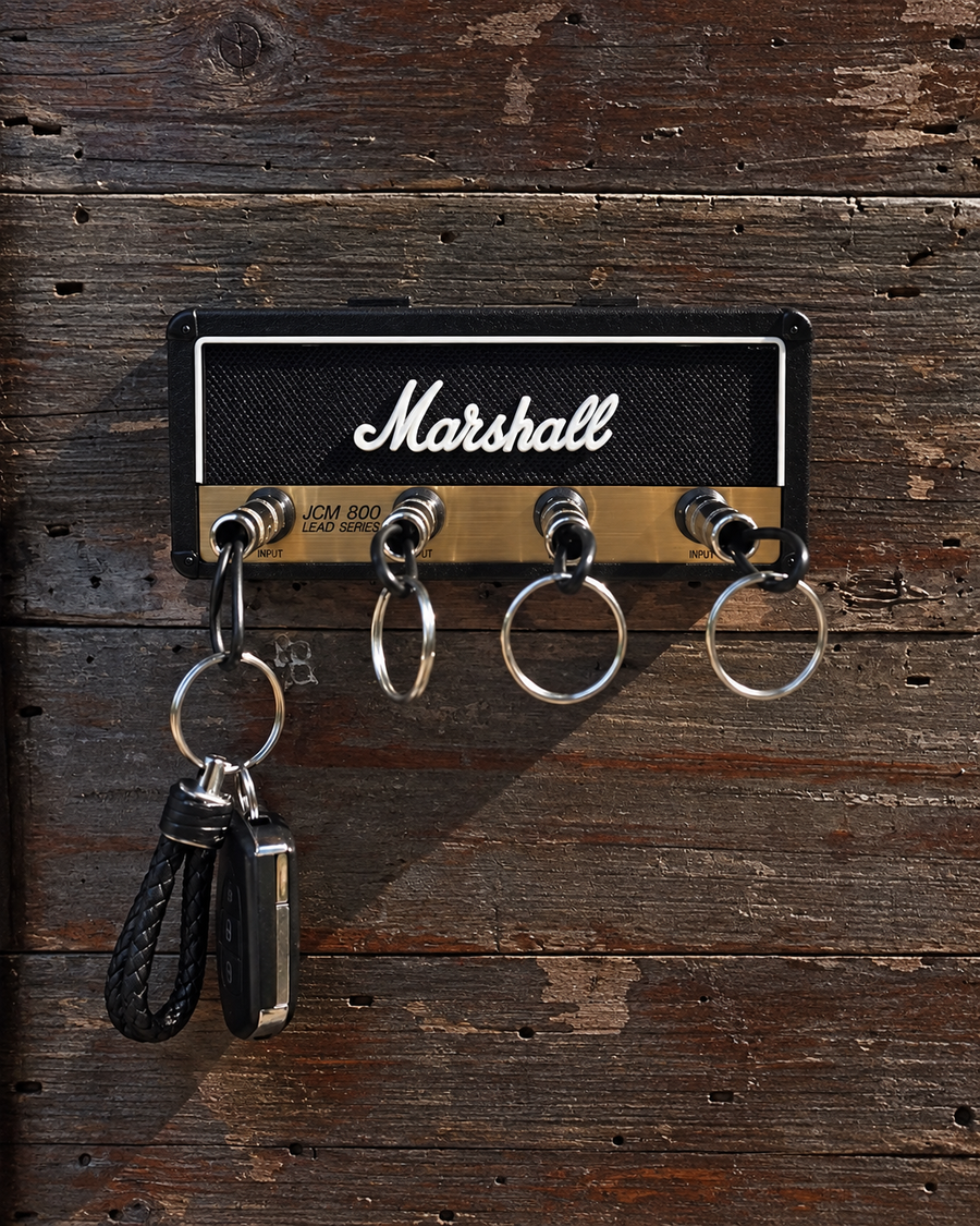 Amplifier key holder against a full wooden background
